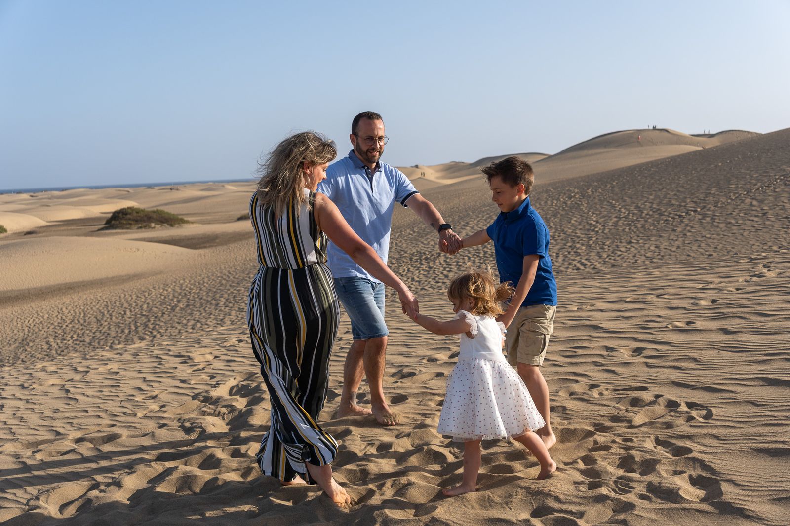 Family dancing in the dunes Gran Canaria